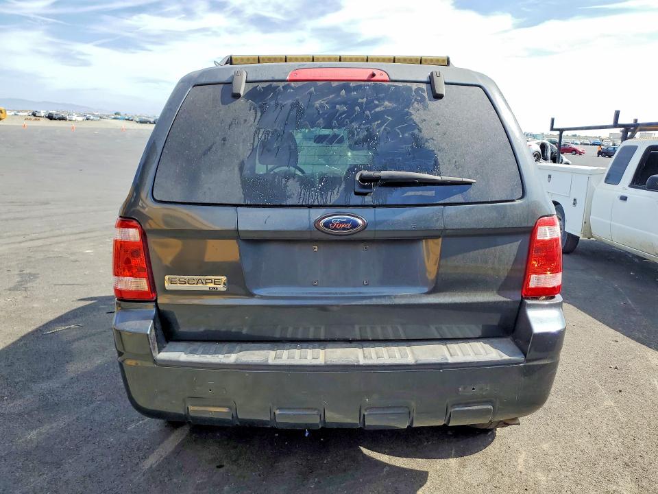 Photo 6 from auction – 2009 FORD ESCAPE with VIN 1FMCU03769KB28671