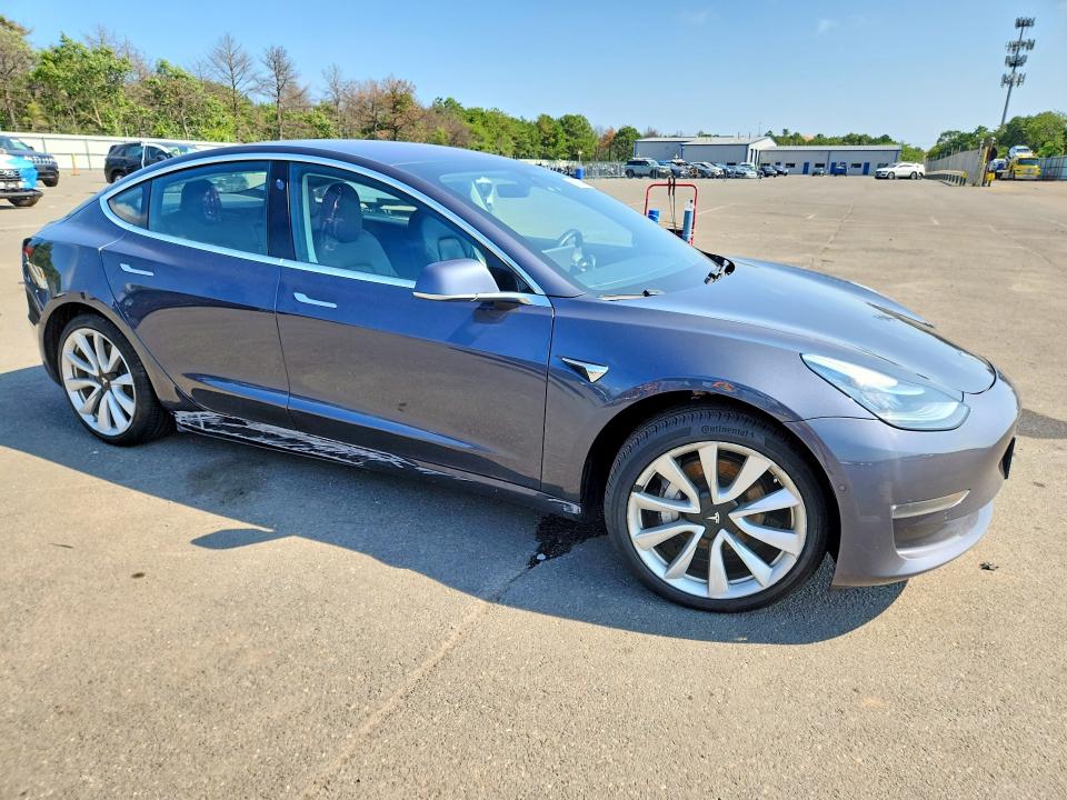 Photo 4 from auction – 2018 TESLA MODEL 3 with VIN 5YJ3E1EA3JF031087
