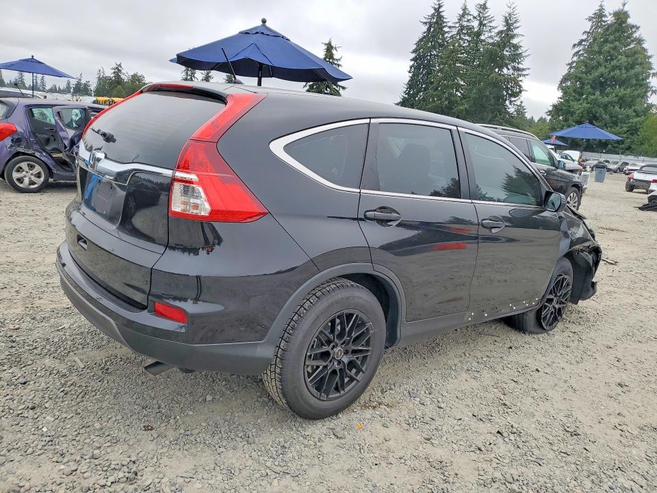 Photo 3 from auction – 2016 HONDA CR-V with VIN 3CZRM3H36GG705560