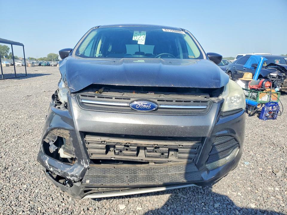 Photo 5 from auction – 2015 FORD ESCAPE with VIN 1FMCU0GX5FUC34720