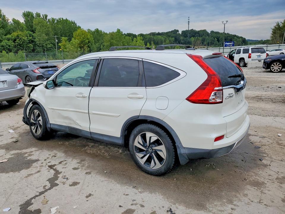 Photo 2 from auction – 2016 HONDA CR-V with VIN 5J6RM4H94GL072635