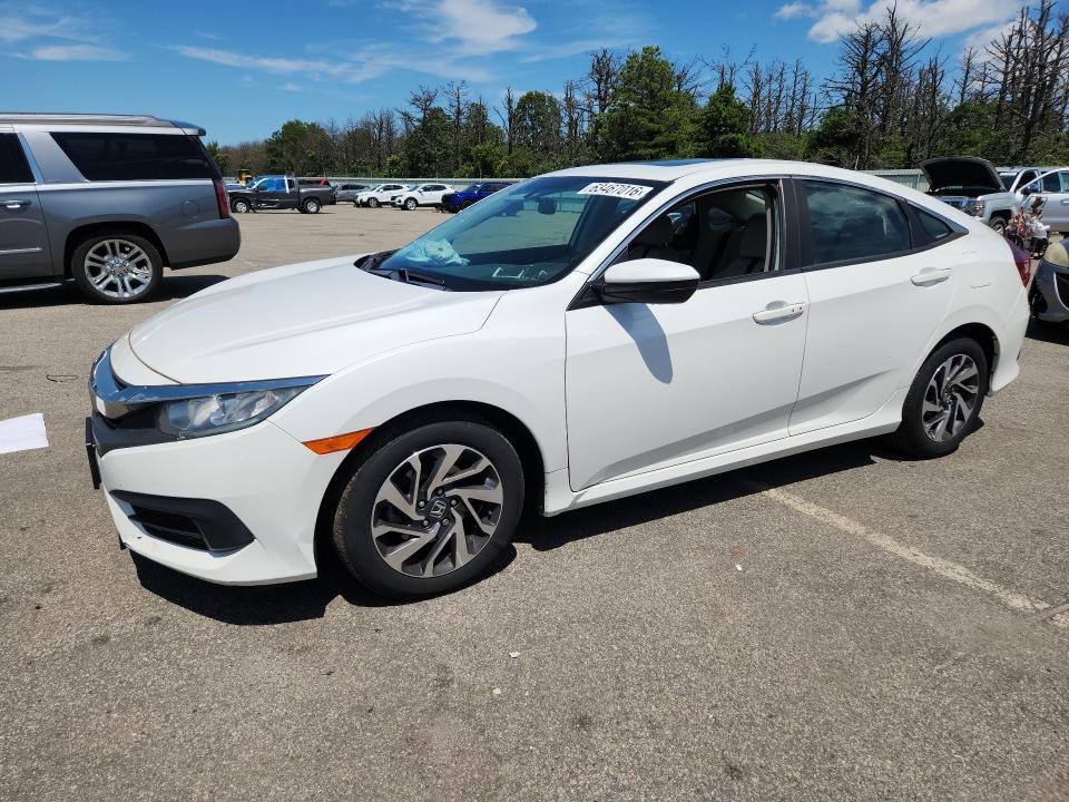 HONDA CIVIC 2018 with VIN 19XFC2F73JE207122 - Photo from auction