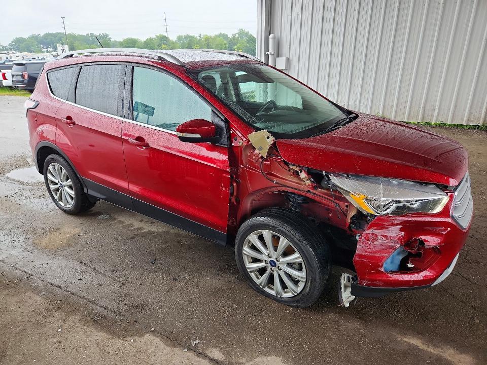 Photo 4 from auction – 2018 FORD ESCAPE with VIN 1FMCU0J96JUA07183