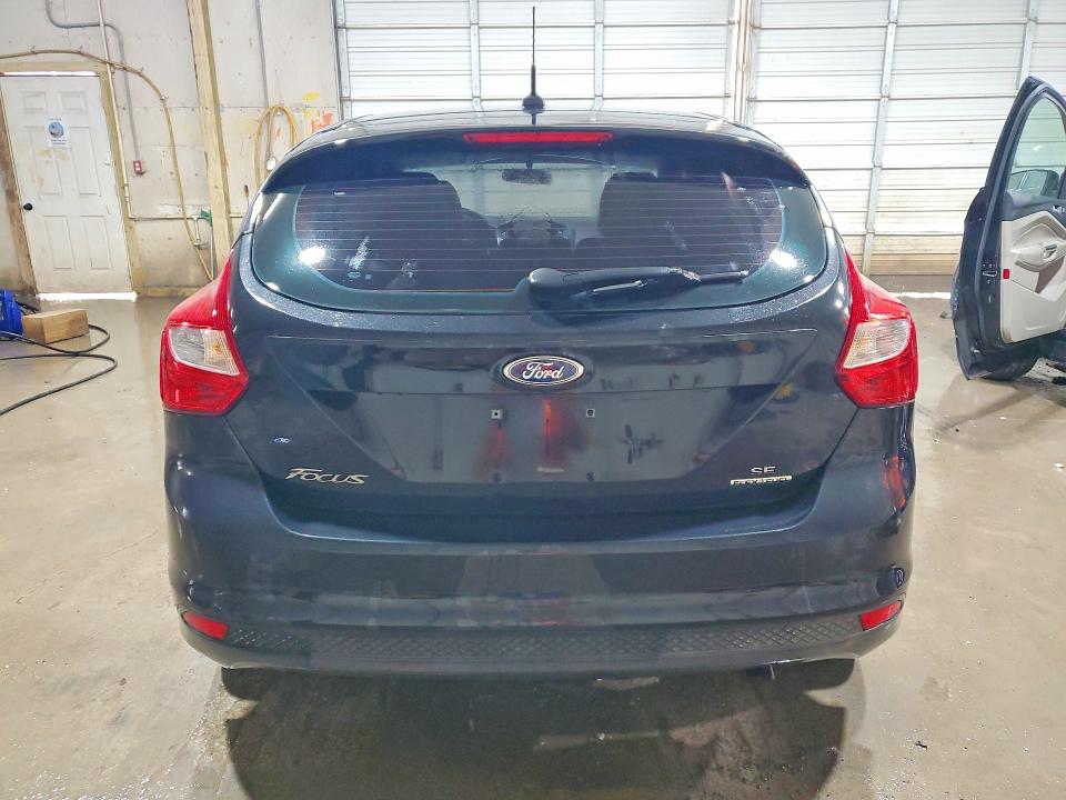 Снимка 6 от търг – 2014 FORD FOCUS с VIN 1FADP3K26EL302966