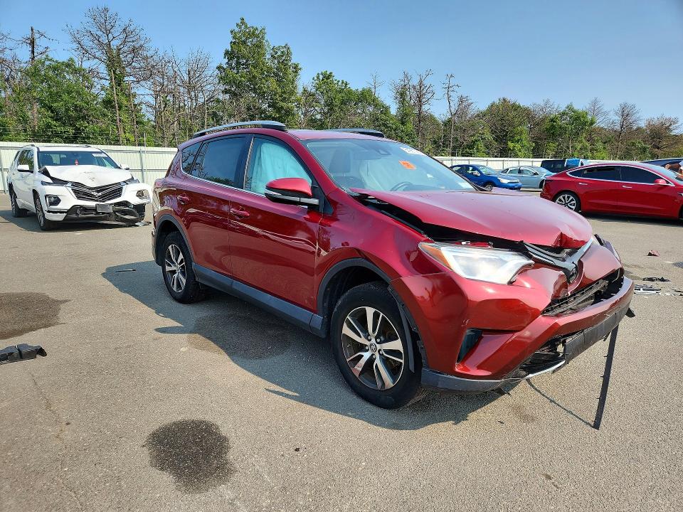 Photo 4 from auction – 2018 TOYOTA RAV4 with VIN 2T3RFREV0JW813415