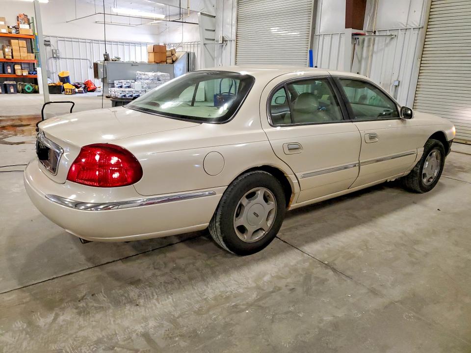 Photo 3 from auction – 2002 LINCOLN CONTINENTAL with VIN 1LNHM97V12Y650694