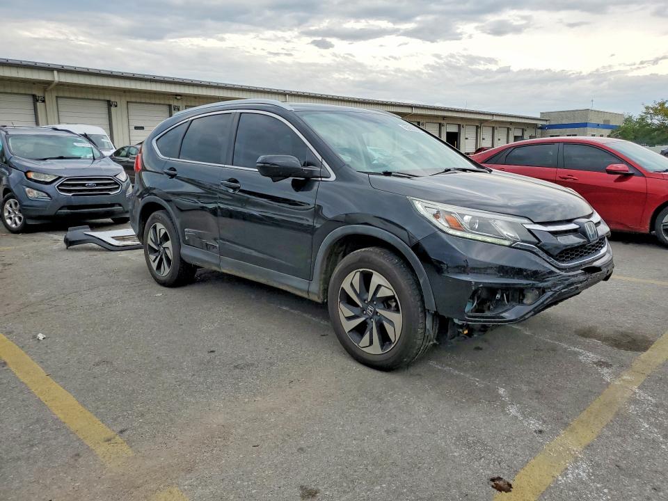 Photo 4 from auction – 2016 HONDA CR-V with VIN 5J6RM4H98GL130973