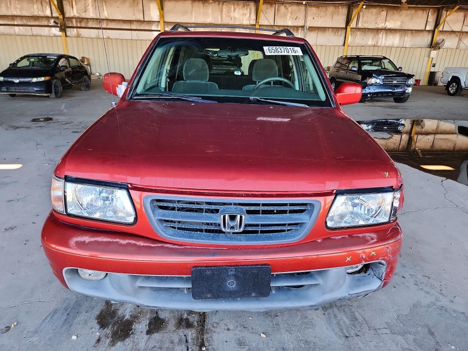 Photo 5 from auction – 2000 HONDA PASSPORT with VIN 4S6CK58W3Y4405595