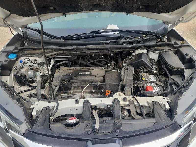 Photo 11 from auction – 2016 HONDA CR-V with VIN 5J6RM4H36GL033492