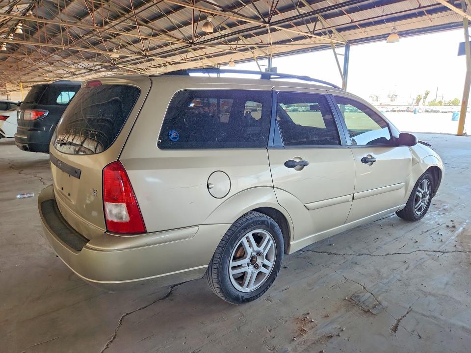Photo 3 from auction – 2000 FORD FOCUS with VIN 1FAFP3630YW229639