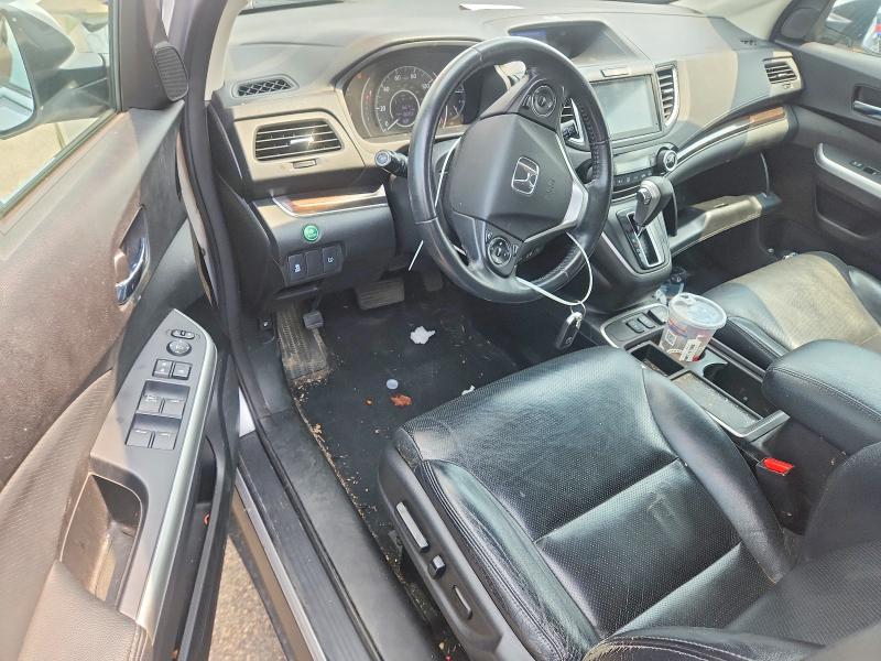 Photo 8 from auction – 2015 HONDA CR-V with VIN 2HKRM4H79FH617946