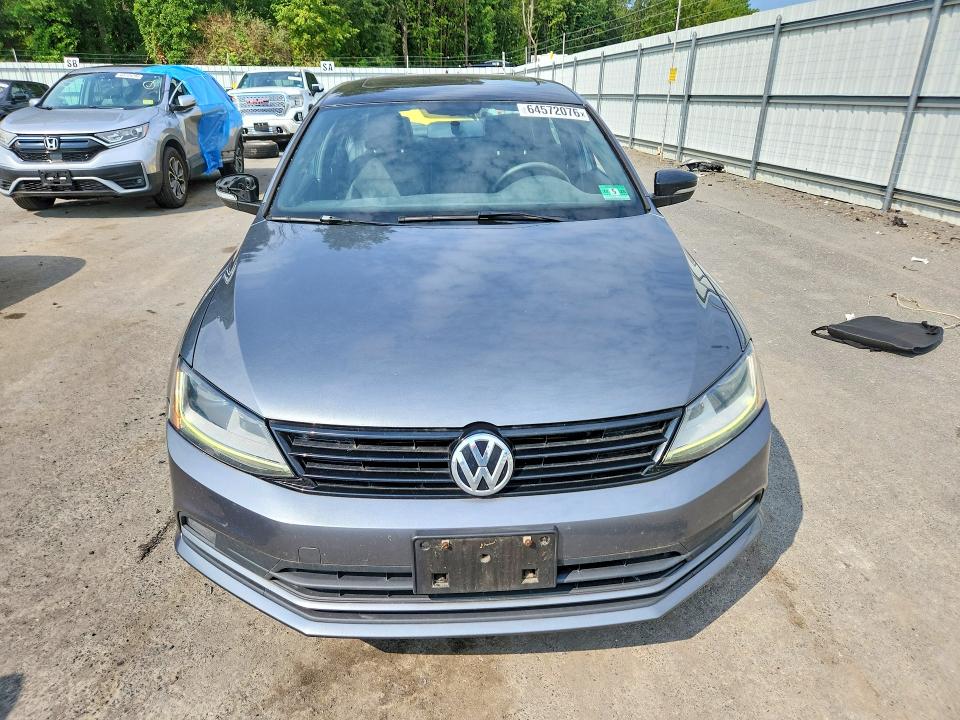 Photo 5 from auction – 2018 VOLKSWAGEN JETTA with VIN 3VWD17AJ4JM219618