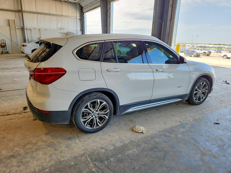 Photo 3 from auction – 2017 BMW X1 with VIN WBXHT3Z35H4A53635