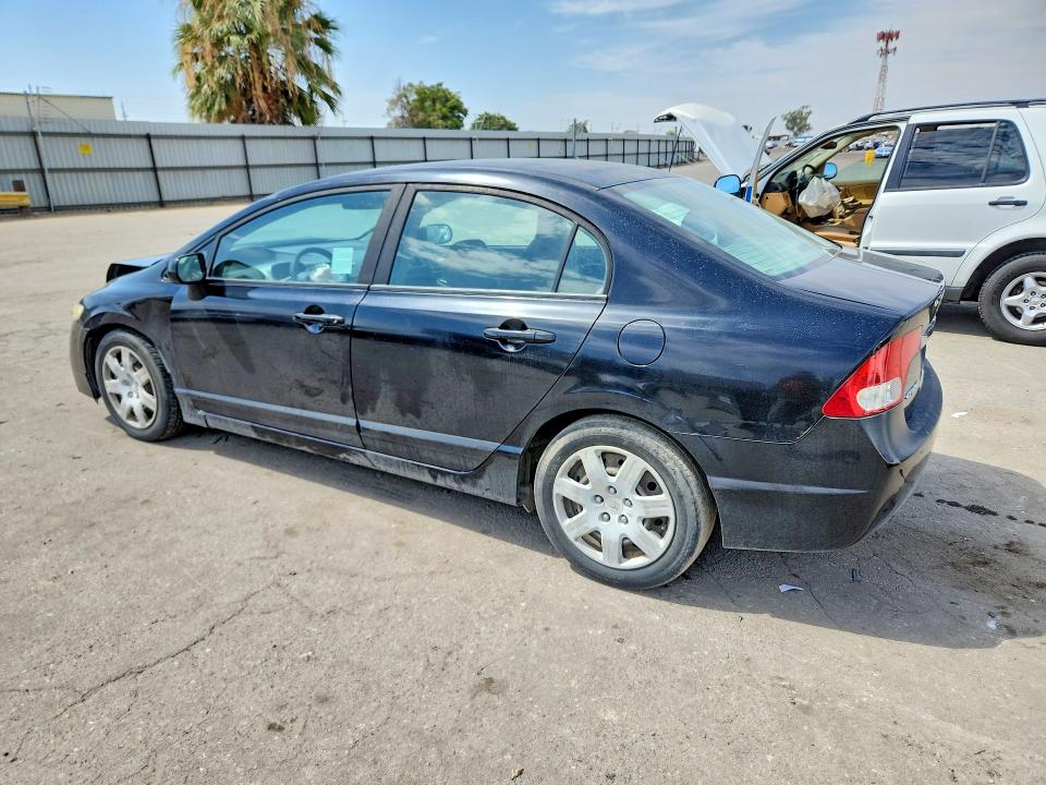 Photo 2 from auction – 2010 HONDA CIVIC with VIN 19XFA1F52AE034076