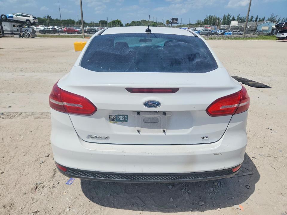 Photo 6 from auction – 2015 FORD FOCUS with VIN 1FADP3F2XFL263939
