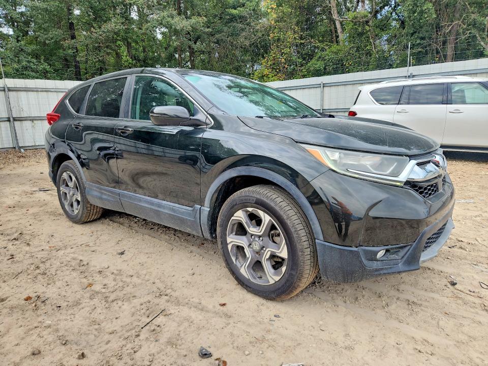 Photo 4 from auction – 2018 HONDA CR-V with VIN 7FARW2H88JE009791