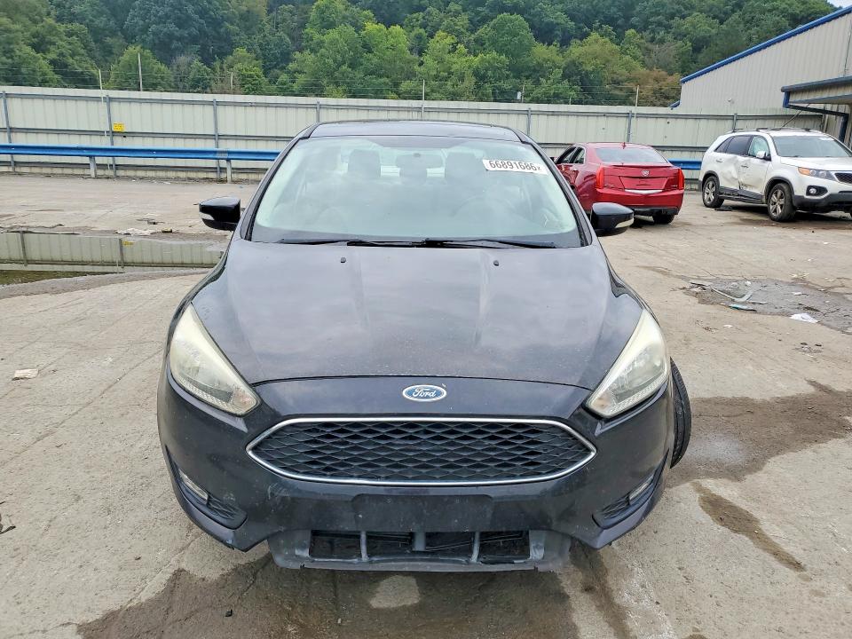 Photo 5 from auction – 2015 FORD FOCUS with VIN 1FADP3F23FL356298