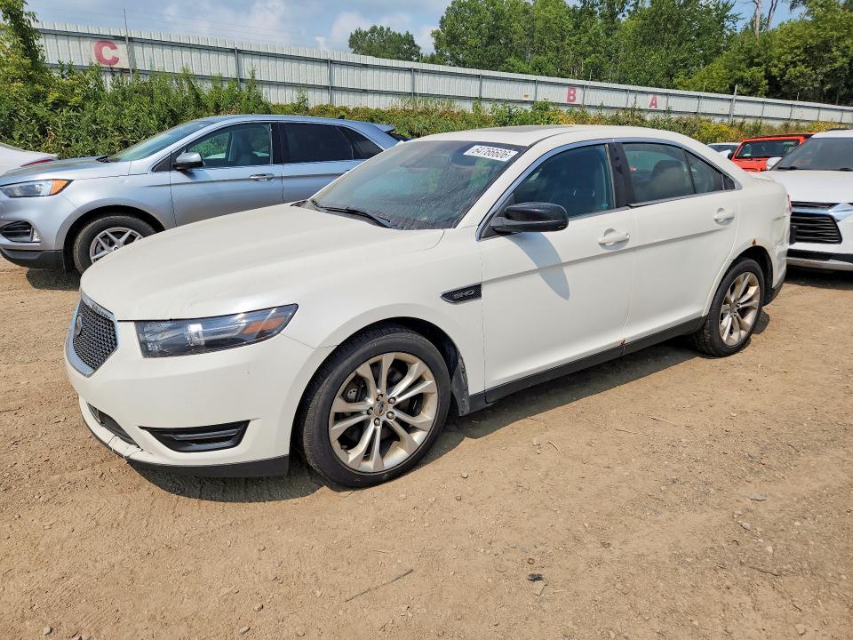 FORD TAURUS 2014 with VIN 1FAHP2KT2EG106942 - Photo from auction