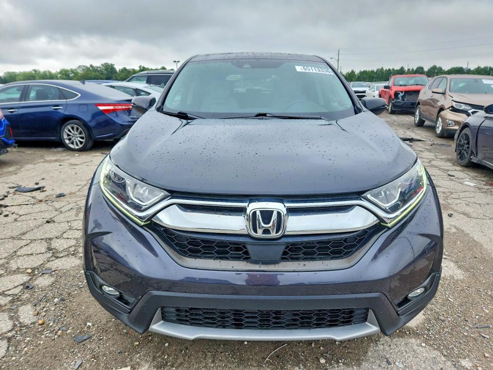 Photo 5 from auction – 2018 HONDA CR-V with VIN 7FARW2H51JE013297