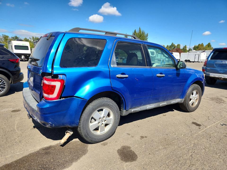 Photo 3 from auction – 2011 FORD ESCAPE with VIN 1FMCU0D75BKB20694