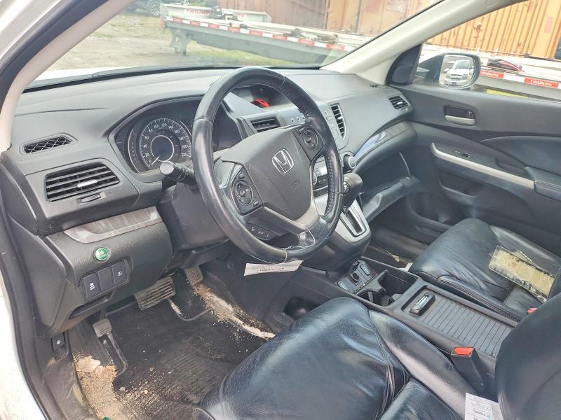 Photo 8 from auction – 2014 HONDA CR-V with VIN 2HKRM4H73EH102679