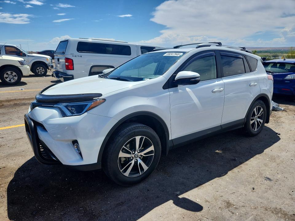 TOYOTA RAV4 2016 with VIN JTMRFREV9GD197686 - Photo from auction