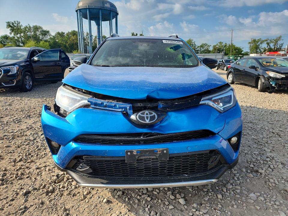 Photo 5 from auction – 2016 TOYOTA RAV4 with VIN 2T3JFREV0GW460101