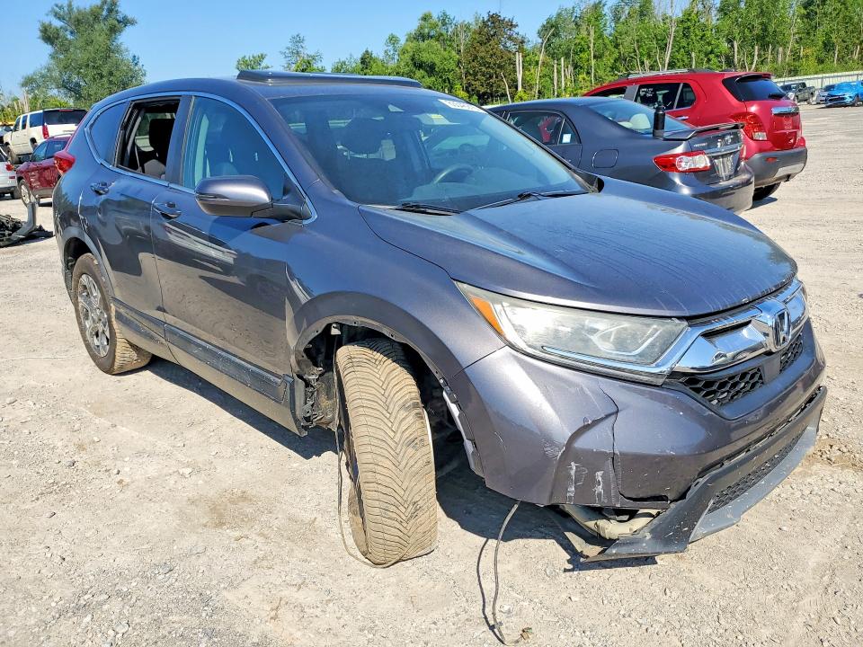 Photo 4 from auction – 2019 HONDA CR-V with VIN JHLRW2H56KX010871
