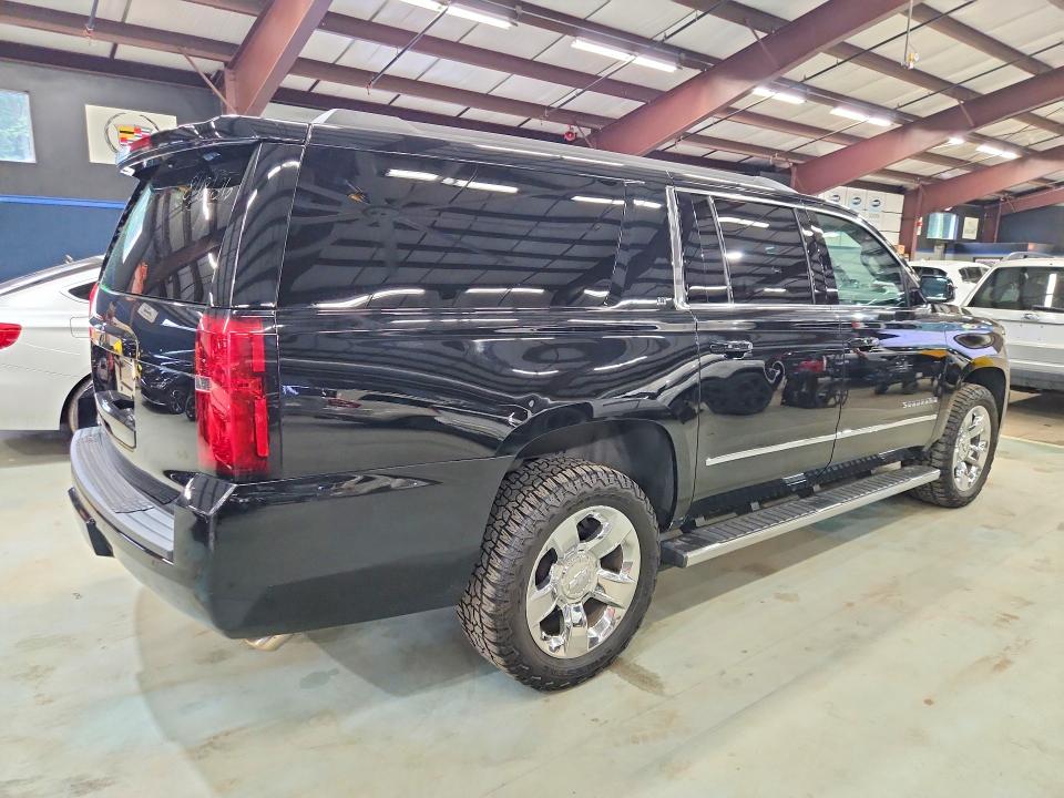 Photo 3 from auction – 2019 CHEVROLET SUBURBAN with VIN 1GNSKHKC4KR150174