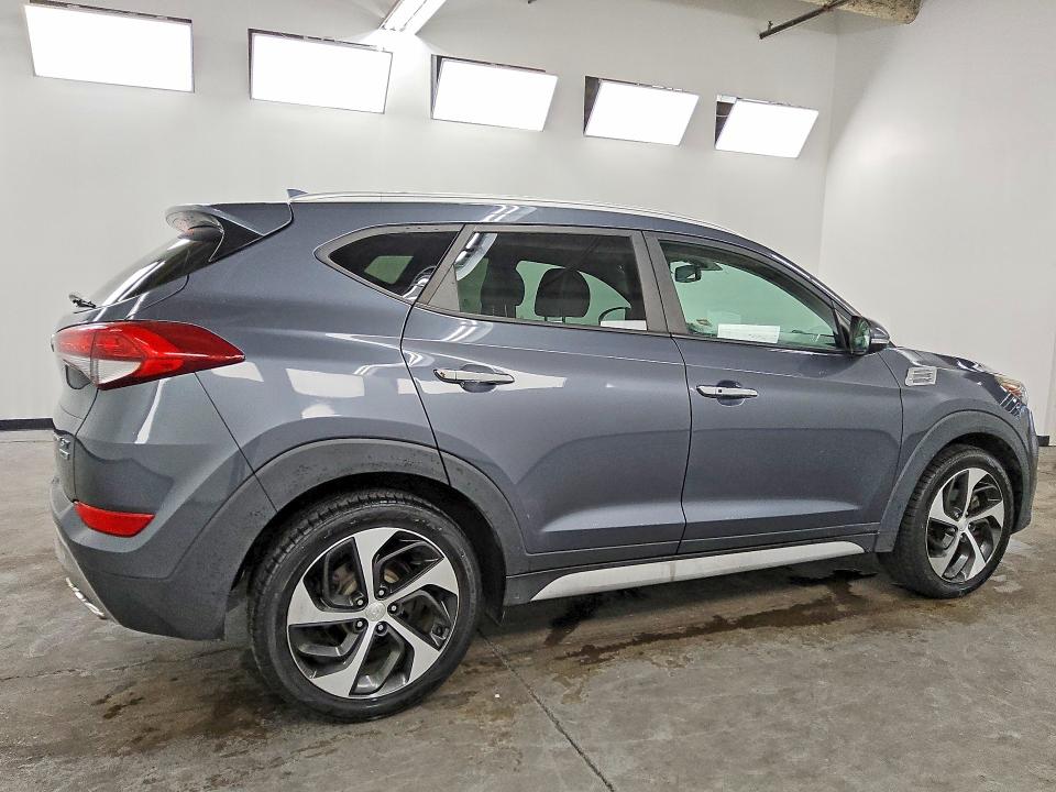 Photo 3 from auction – 2017 HYUNDAI TUCSON with VIN KM8J3CA26HU380717