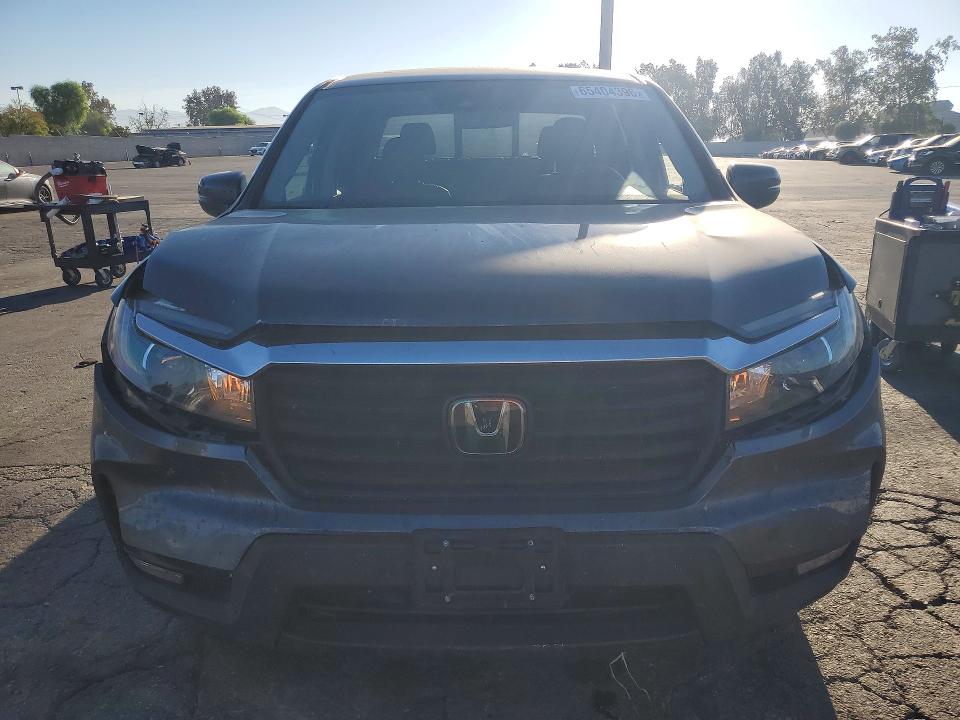 Photo 5 from auction – 2023 HONDA RIDGELINE with VIN 5FPYK3F56PB058246