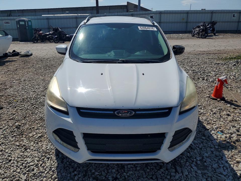 Photo 5 from auction – 2014 FORD ESCAPE with VIN 1FMCU9G93EUB86042