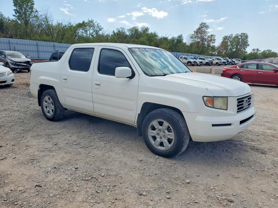 Photo 4 from auction – 2006 HONDA RIDGELINE with VIN 2HJYK16546H509935