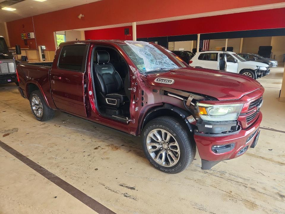 Photo 4 from auction – 2021 RAM 1500 with VIN 1C6SRFJT0MN623645