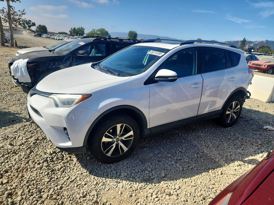 TOYOTA RAV4 2018 with VIN 2T3RFREV4JW815586 - Photo from auction