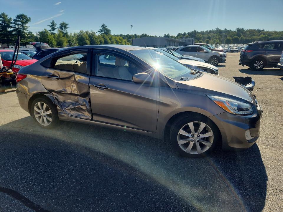 Photo 4 from auction – 2014 HYUNDAI ACCENT with VIN KMHCU4AE4EU590069