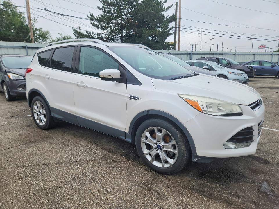 Photo 4 from auction – 2015 FORD ESCAPE with VIN 1FMCU9JX8FUA05350
