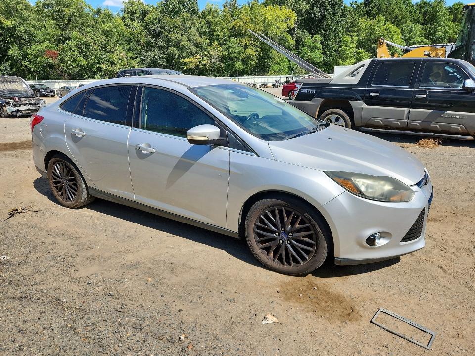 Photo 4 from auction – 2013 FORD FOCUS with VIN 1FADP3J20DL301375