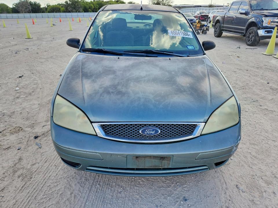 Фото 5 с аукциона – 2005 FORD FOCUS с VIN 1FAFP34NX5W272448