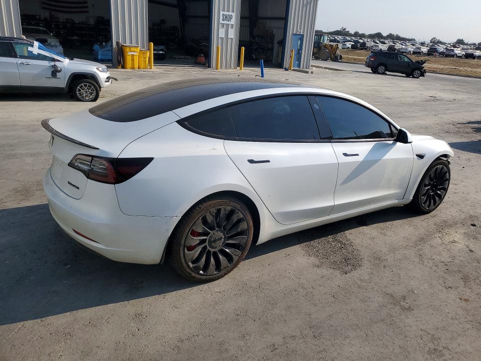 Photo 3 from auction – 2022 TESLA MODEL 3 with VIN 5YJ3E1EC8NF193188