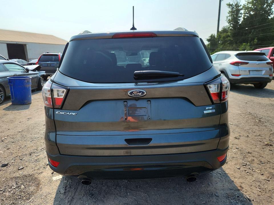 Photo 6 from auction – 2018 FORD ESCAPE with VIN 1FMCU9GD8JUA44025