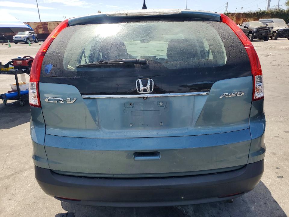 Photo 6 from auction – 2014 HONDA CR-V with VIN 2HKRM4H31EH603860