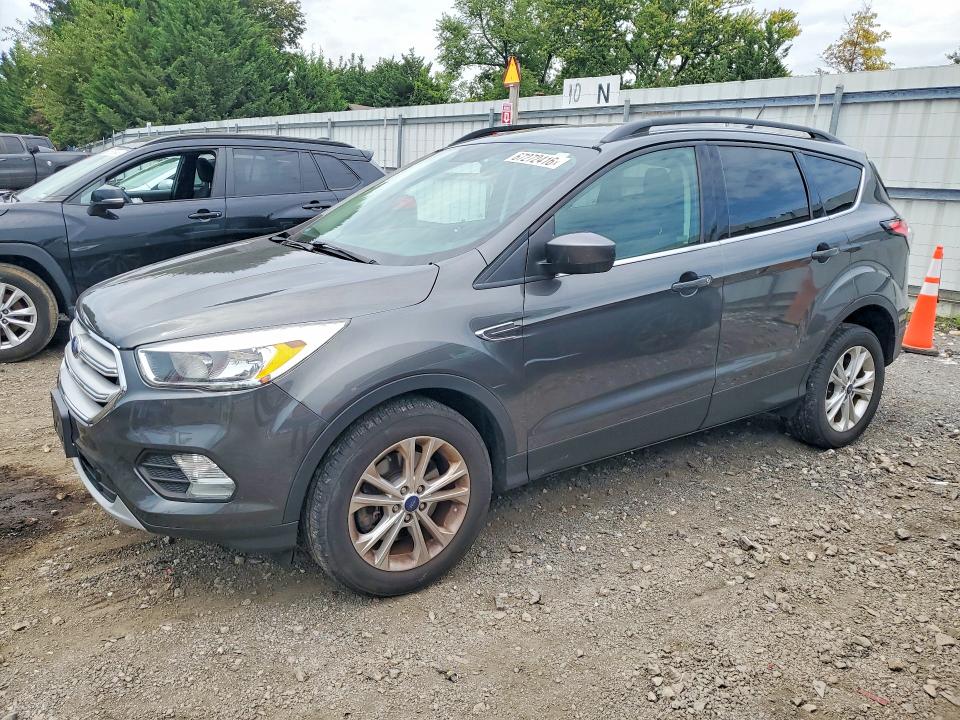 FORD ESCAPE 2018 with VIN 1FMCU9GD5JUB05394 - Photo from auction