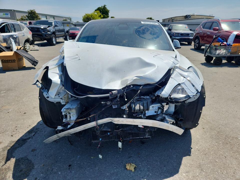 Photo 5 from auction – 2021 TESLA MODEL 3 with VIN 5YJ3E1EC5MF850883