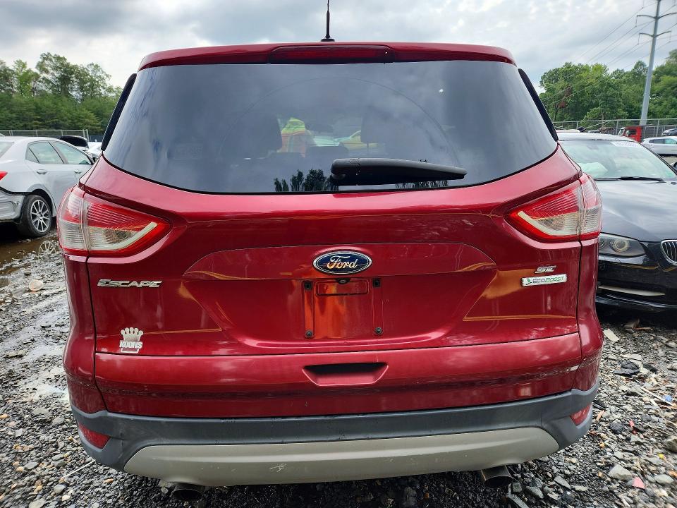 Photo 6 from auction – 2014 FORD ESCAPE with VIN 1FMCU0GX1EUD22579