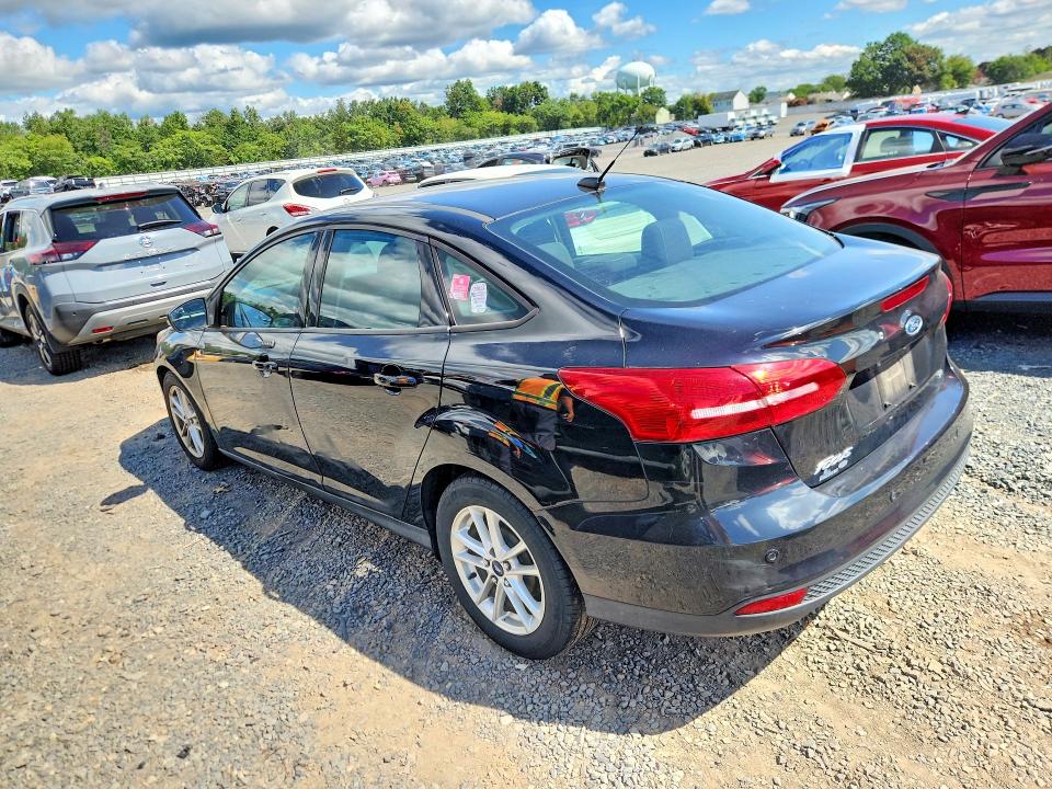 Photo 2 from auction – 2016 FORD FOCUS with VIN 1FADP3F22GL228099