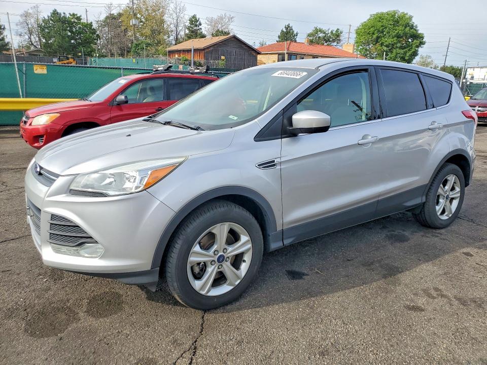 FORD ESCAPE 2016 with VIN 1FMCU9GX9GUB07586 - Photo from auction