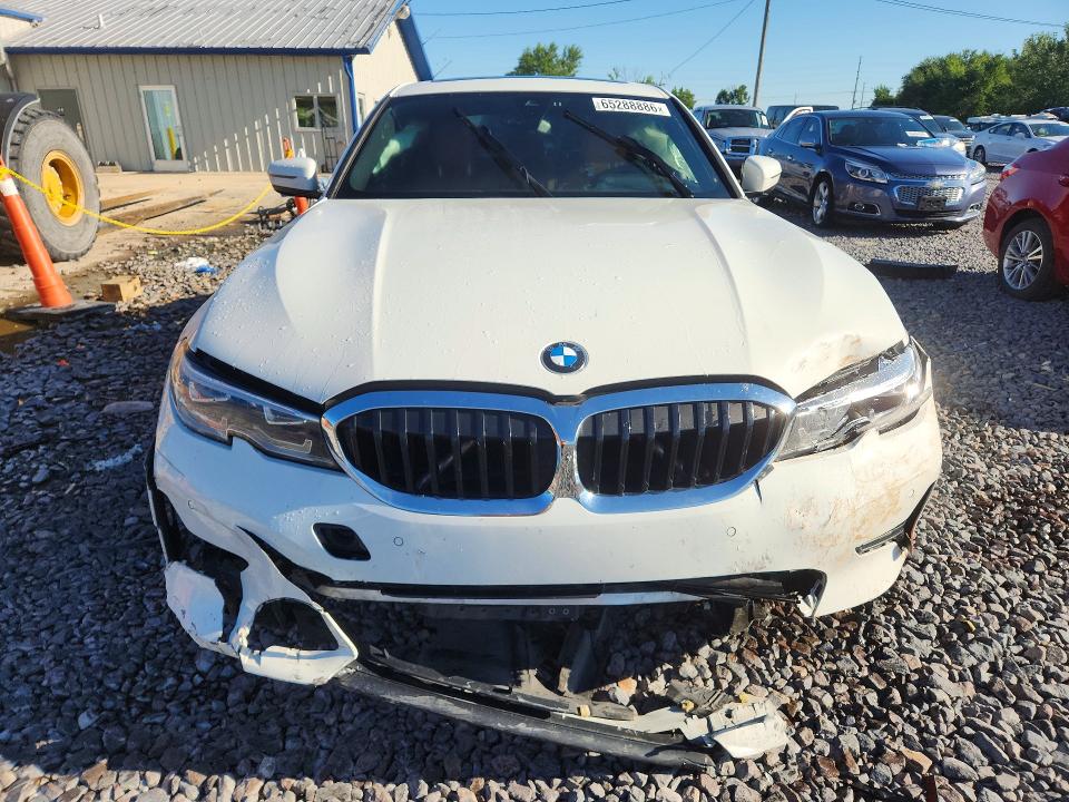 Photo 5 from auction – 2022 BMW 330XI with VIN 3MW5R7J06N8C51618
