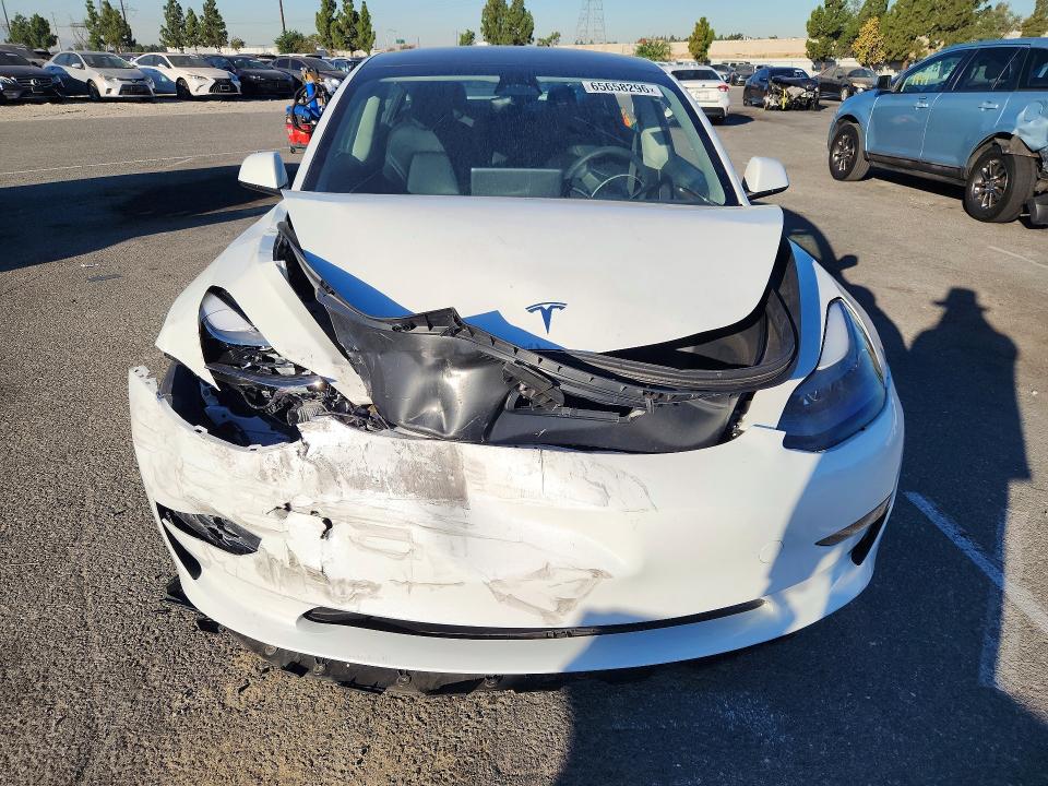 Photo 5 from auction – 2023 TESLA MODEL 3 with VIN 5YJ3E1EA5PF598183
