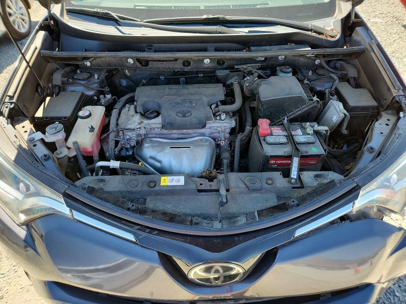 Photo 12 from auction – 2018 TOYOTA RAV4 with VIN JTMWFREV0JJ173899